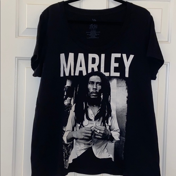 white shirt with feathers